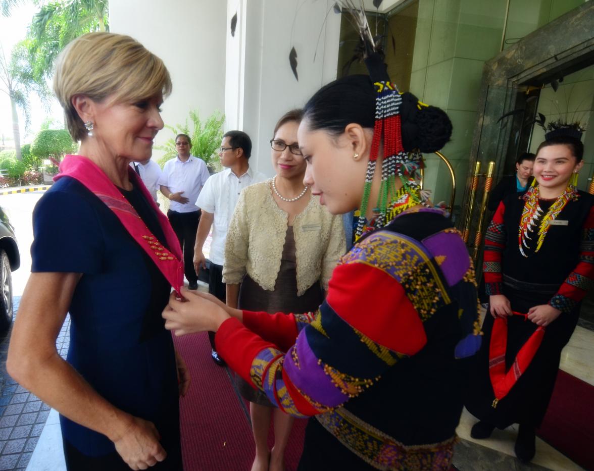 Foreign Minister Julie Bishop is presented with lei of Indigenous fabric in Davao City 17 March 2017. Photo credit: DFAT/ Mark Lim.