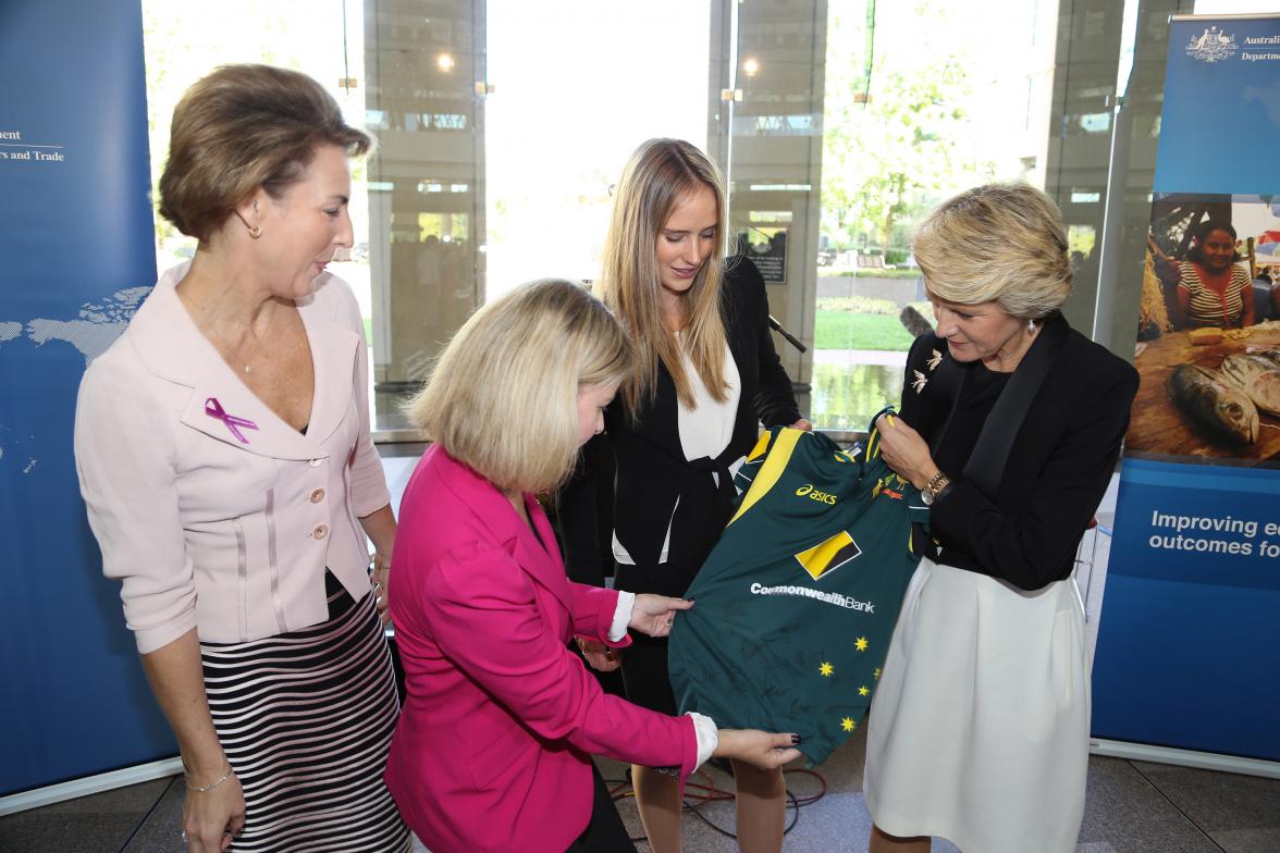 Senator Cash, Ambassador Stott Despoja, Ellyse Perry and Foreign Minister Bishop with the autographed Australian Women's Cricket shirt. 3 March 2014.