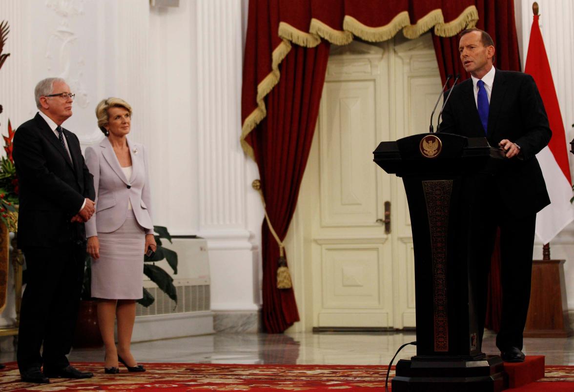 Minister for Trade and Investment Andrew Robb with Foreign Minister Julie Bishop and Prime Minister Tony Abbott at Merdeka Palace in Jakarta on 30 September 2013.