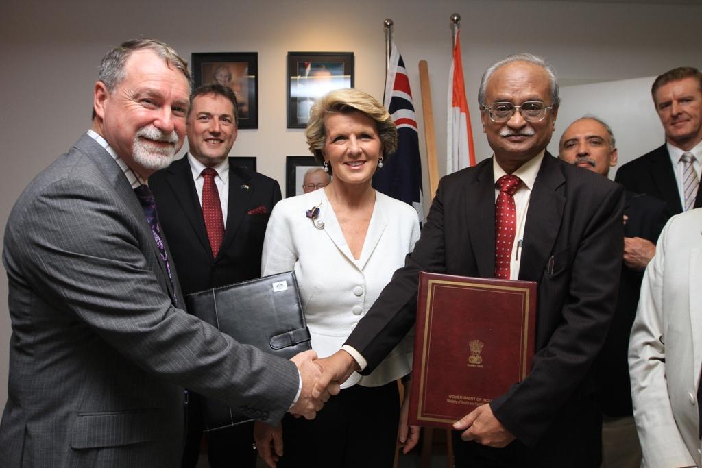 Foreign Minister Julie Bishop with Andrew Way of Alfred Health and Prof MC Misra of AIIMS after the MoU signing. 16 November 2013