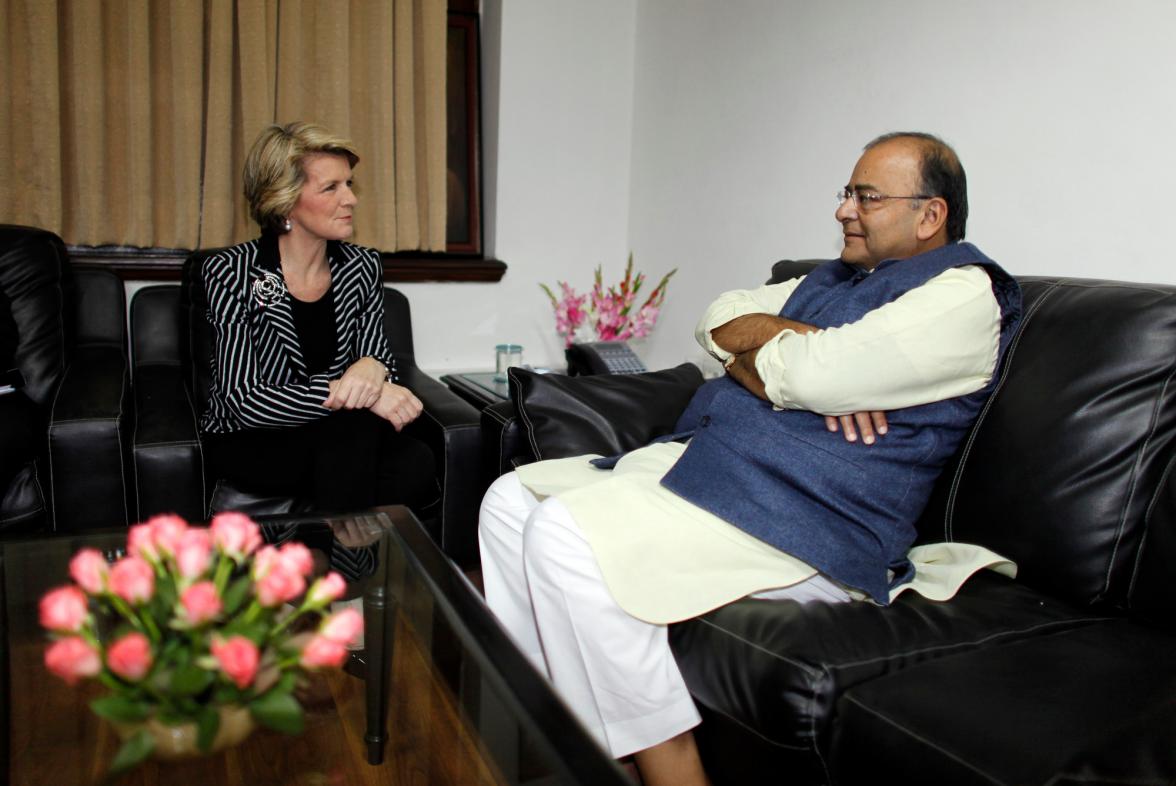 Australian Foreign Minister Julie Bishop, centre, talks to Leader of Opposition, Rajya Sabha or Upper House, Indian Parliament, Arun Jaitley, right, at the Indian Parliament in New Delhi, India, Monday, November 18, 2013. (Photo/Mustafa Quraishi)