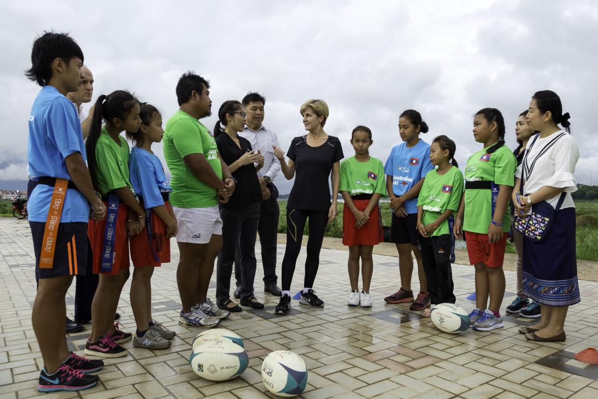 Foreign Minister Julie Bishop with young Lao Rugby players from the Australian aid-funded ‘Pass it Back’ sports development program. Vientiane, Laos. 26 July 2016. Photo credit: DFAT/Bart Verweij