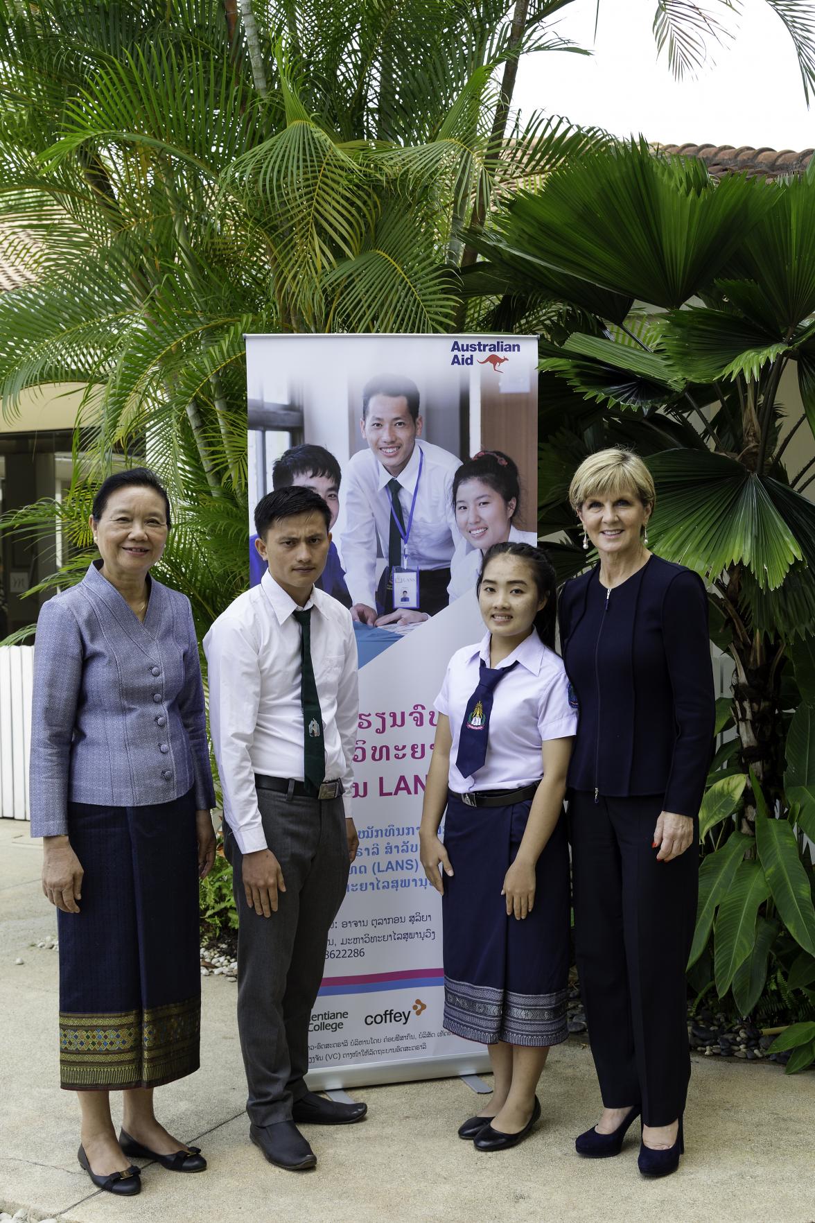 Foreign Minister Julie Bishop and Mme Sengdeuan Lachanthabon, Lao Minister of Education and Sport, with two high performing graduates of the Laos-Australia National Scholarship program (LANS) in Vientiane, Laos. 27 July 2016. Photo credit: DFAT/Bart Verwe