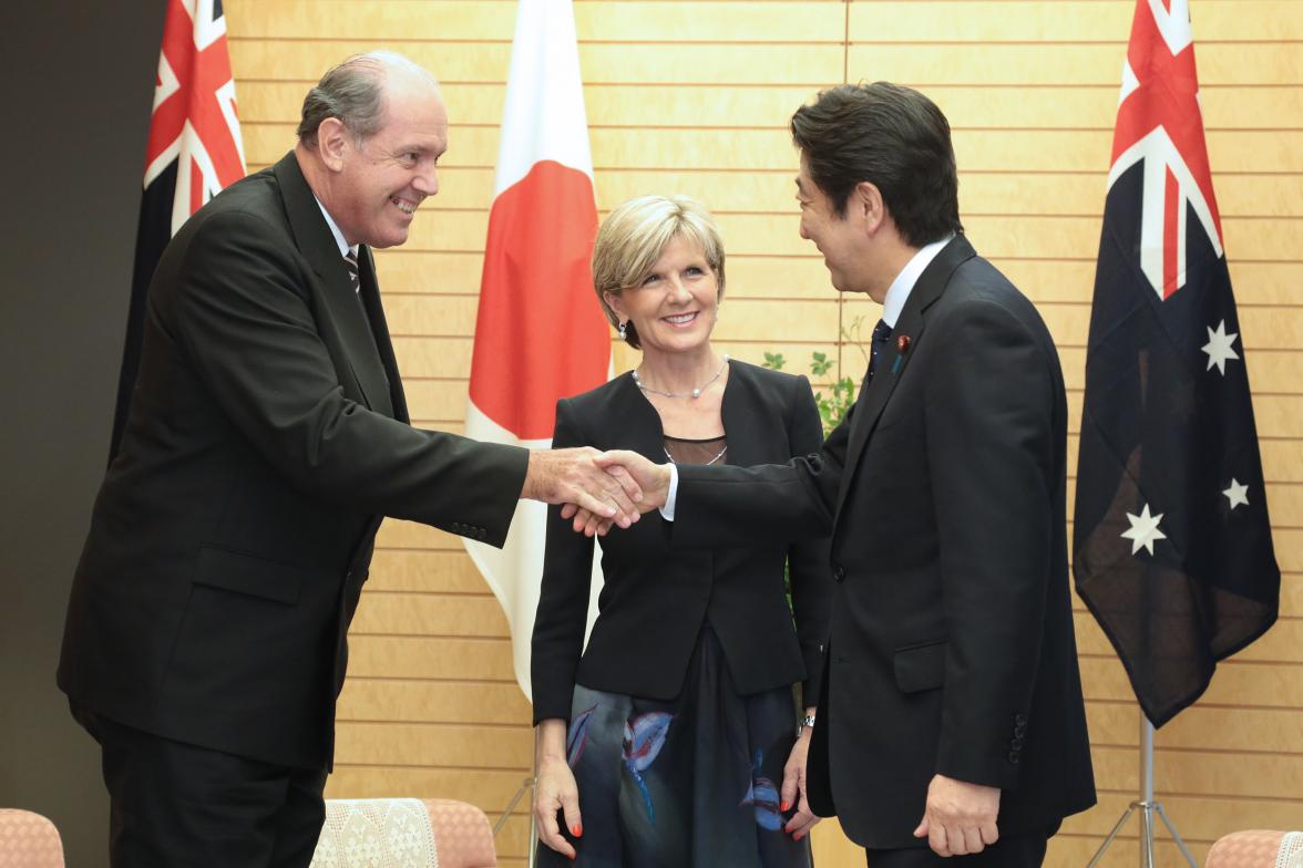 Senator the Hon David Johnston, Minster for Defence, the Hon Julie Bishop MP, Minister for Foreign Affairs, and Japanese Prime Minister, Mr Shinzo Abe shaking hands at a meeting at the Prime Minister's official residence.