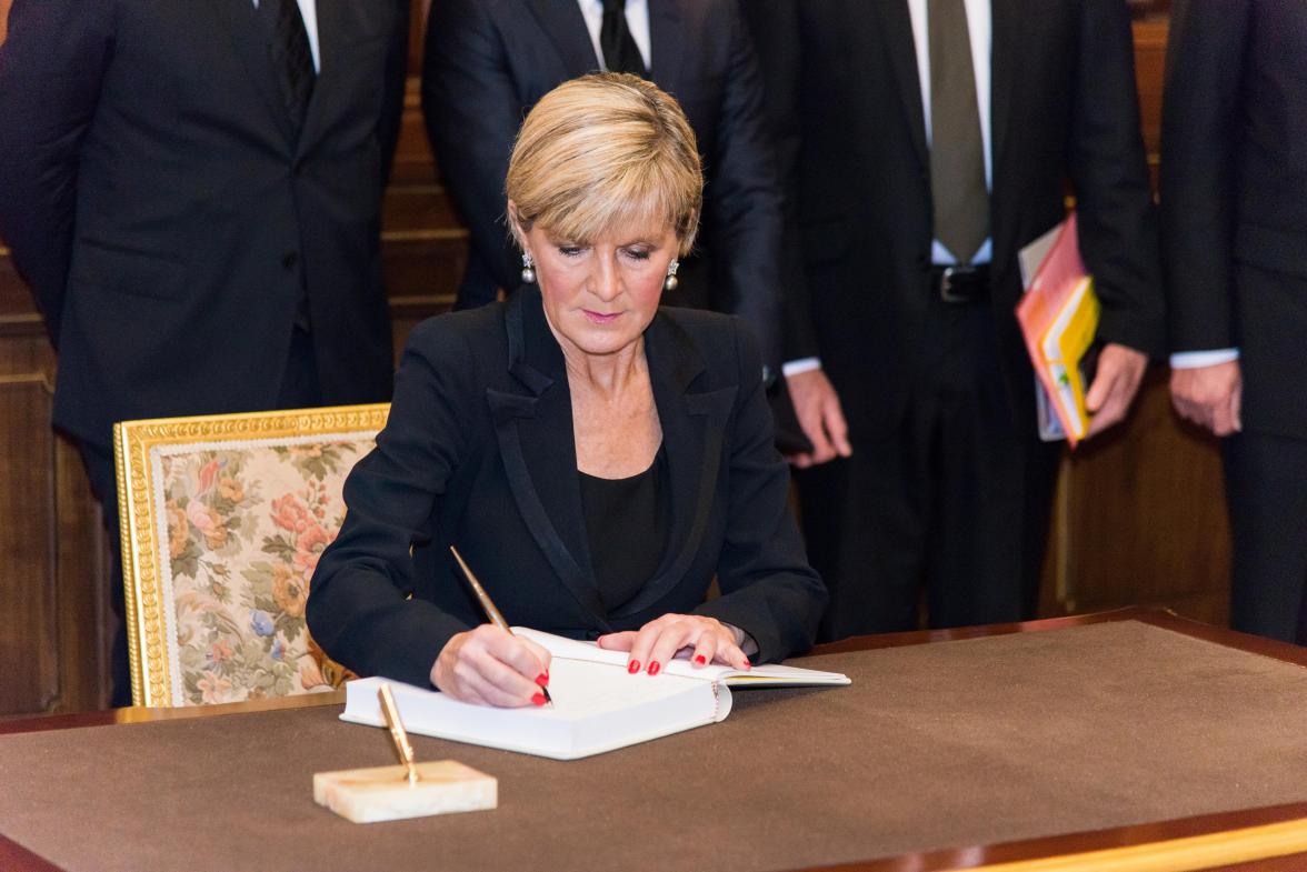 Foreign Minister Julie Bishop signs a condolence book to honour and pay respects to His Majesty King Bhumibol Adulyadej at the Grand Palace on behalf of the Australian people.