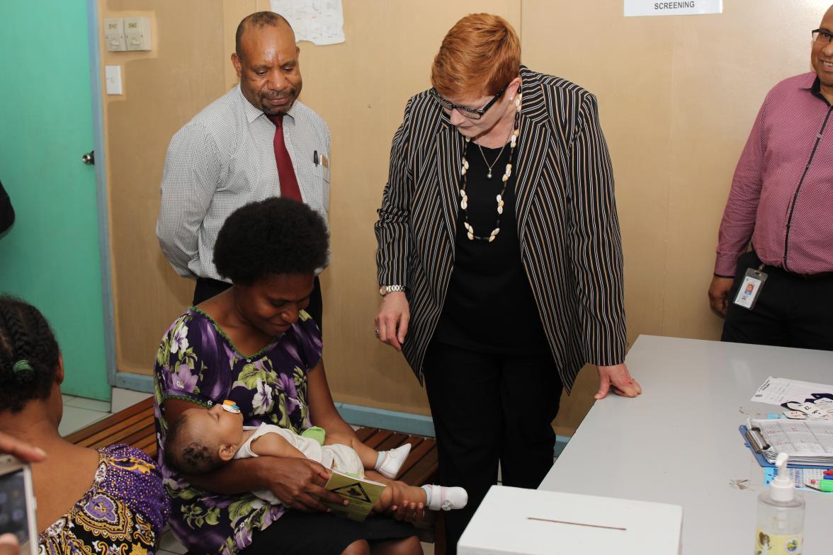 The Minister meets with patients receiving polio vaccinations at the Well Baby Clinic in Port Moresby