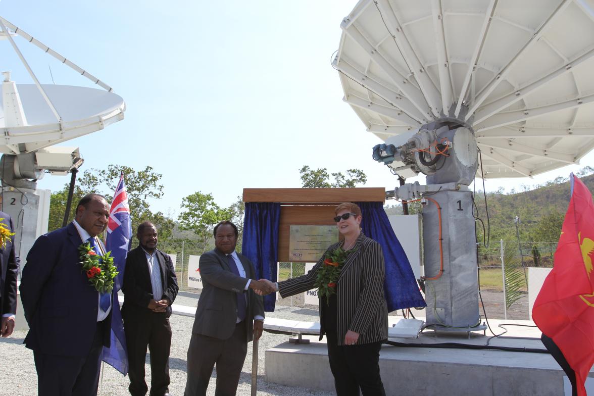 Hon Rimbink Pato, Minister for Foreign Affairs (left), Hon William Duma, Minister for State Enterprises (2nd from right) and Minister Payne at the launch of equipment at the O3b earth station