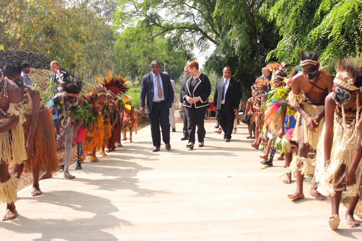 Dr Andrew Moutu, Foreign Minister Marise Payne, and Foreign Affairs Minister Rimbink Pato welcomed by traditional dancers at the National Museum & Art Gallery.