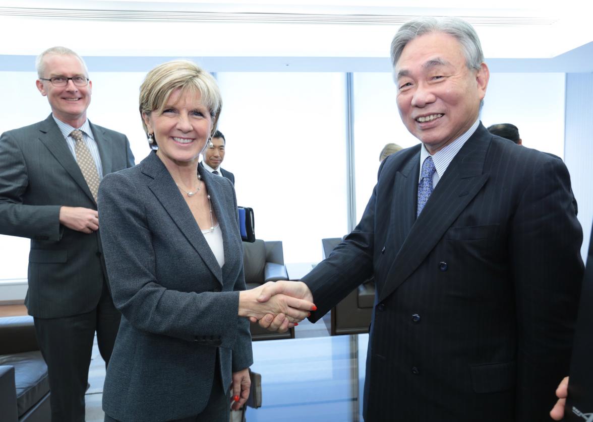 The Hon Julie Bishop MP, Minister for Foreign Affairs shaking hands with Mr Yoshiyuki Kasai, Honorary Chair, Central Japan Rail Company.  HE Mr Bruce Miller, Australian Ambassador to Japan, standing in the background.