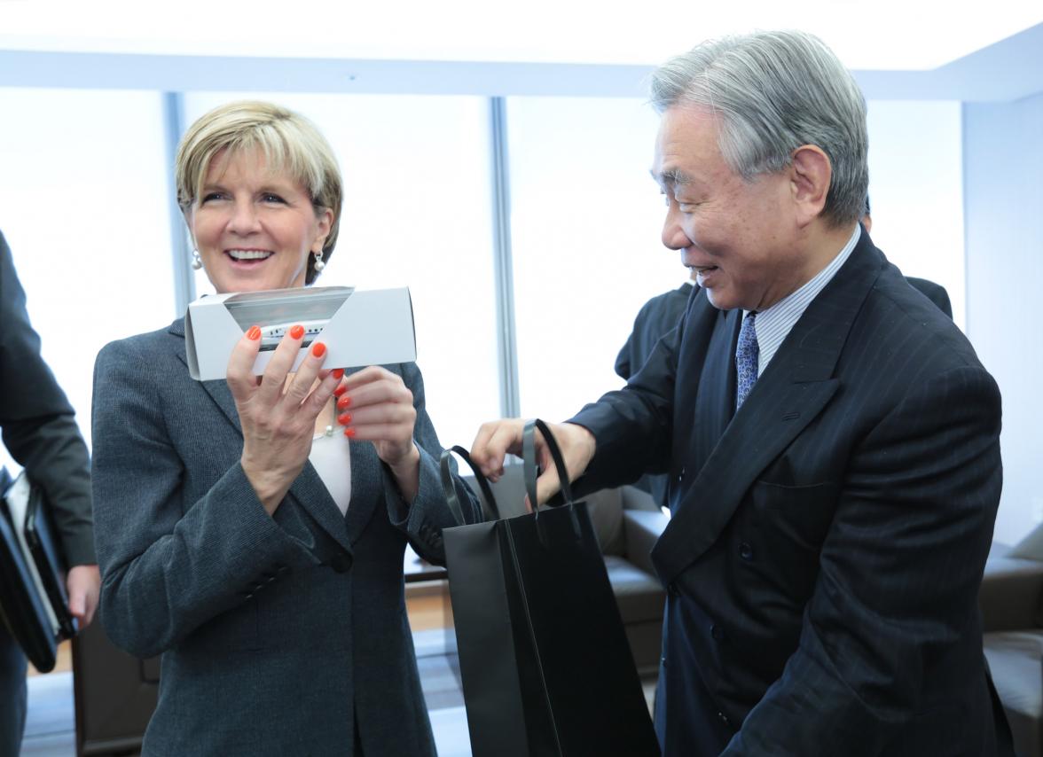 The Hon Julie Bishop MP, Minister for Foreign Affairs receives a model shinkansen (bullet train) from Mr Yoshiyuki Kasai, Honorary Chair, Central Japan Rail Company.