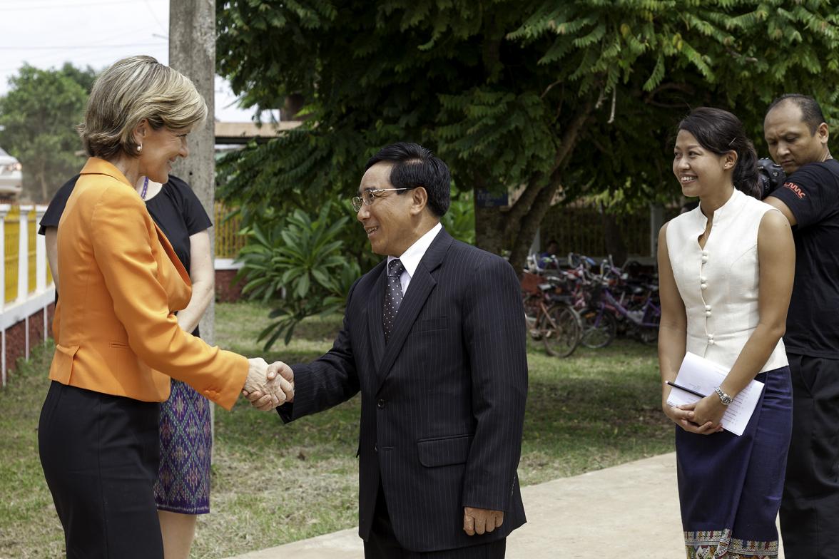 Foreign Minister Julie Bishop is greeted by H.E. Dr. Phankham Viphavanh, Lao minister of Education and Sports. Photo: Bart Verweij