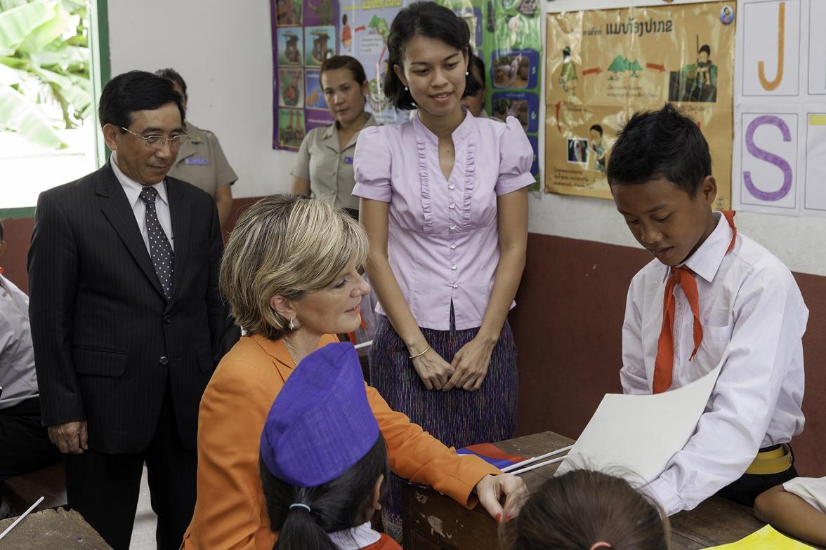 Foreign Minister Julie Bishop with H.E. Dr. Phankham Viphavanh, Lao minister of Education and Sports meeting  students at Hom Neua Primary School. Photo: Bart Verweij