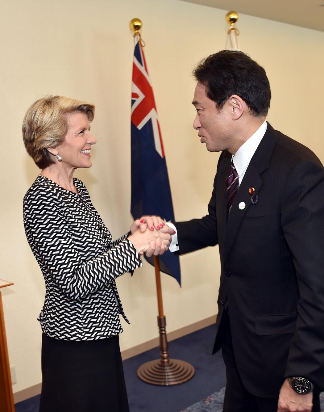 The Hon Julie Bishop MP, Minister for Foreign Affairs shaking hands with HE Mr Fumio Kishida, Japanese Minister for Foreign Affairs.