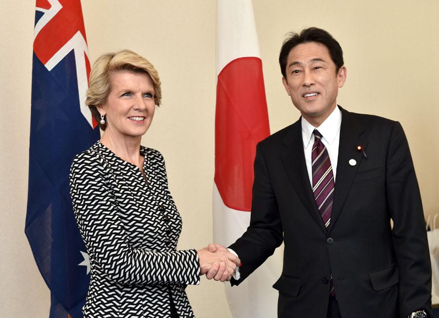 The Hon Julie Bishop MP, Minister for Foreign Affairs shaking hands with HE Mr Fumio Kishida, Japanese Minister for Foreign Affairs.