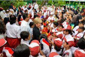 21 March 2016, Jakarta, Indonesia:  Foreign Minister Julie Bishop, with Minister for Education and Cultural Affairs Mr Anies Baswedan, greets schoolchildren of SDN 02 Menteng, Indonesia.