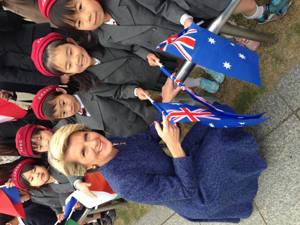 Foreign Minister Julie Bishop is greeted by students at the Cenotaph memorial for A-bomb victims in Hiroshima.