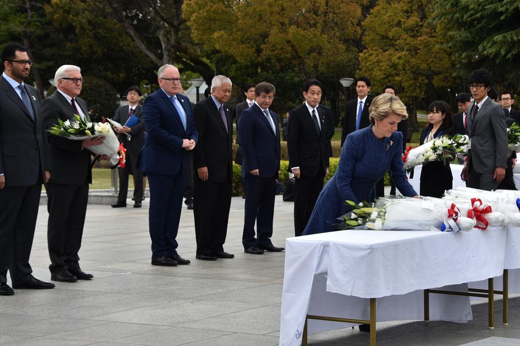 The Hon Julie Bishop MP, Minister for Foreign Affairs, preparing to dedicate flowers at the Cenotaph in Hiroshima.