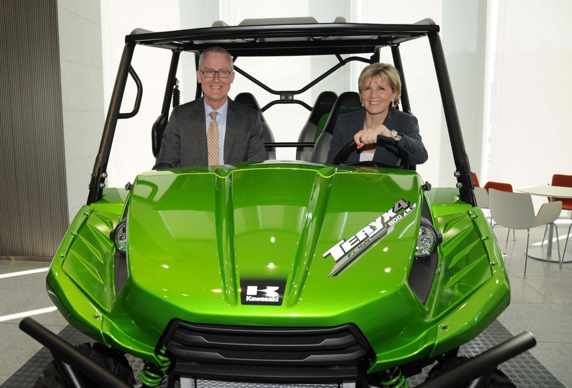 HE Mr Bruce Miller, Australian Ambassador to Japan and the Hon Julie Bishop MP, Minister for Foreign Affairs, test-driving new machinery at Kawasaki Heavy Industries.