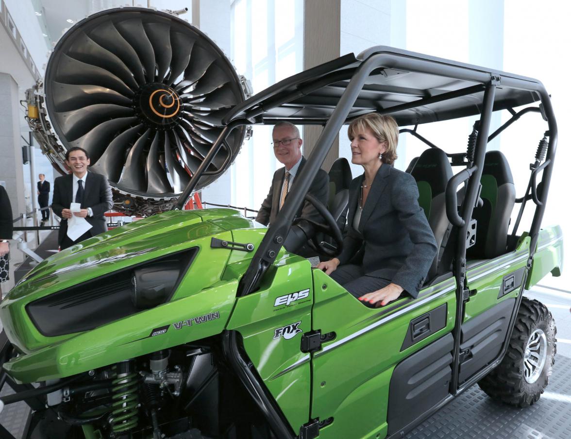 HE Mr Bruce Miller, Australian Ambassador to Japan and the Hon Julie Bishop MP, Minister for Foreign Affairs, test-driving new machinery at Kawasaki Heavy Industries.