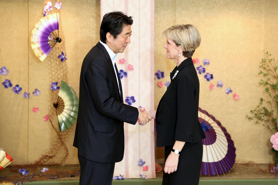 Australian Foreign Minister Julie Bishop is greeted by Japanese Prime Minister Shinzo Abe at the opening of the PALM7 Summit in Iwaki Japan. 23 May 2015.