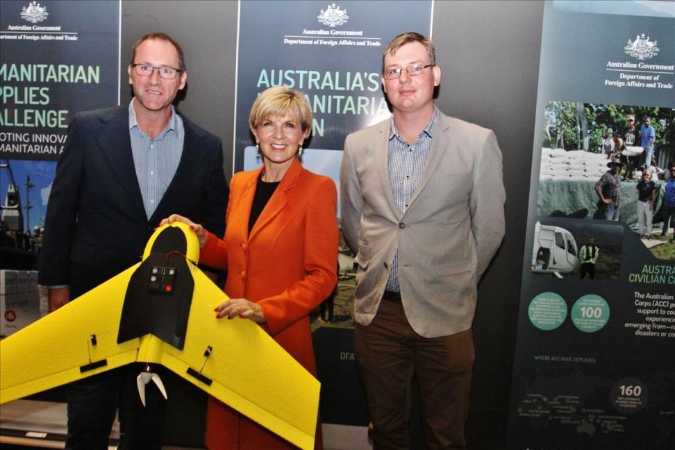 Pacific Humanitarian Challenge winners Jack Hurley (left) and Sam Cohen from Firetail showcase their humanitarian assistance drone to Foreign Minister Bishop. Credit: DFAT