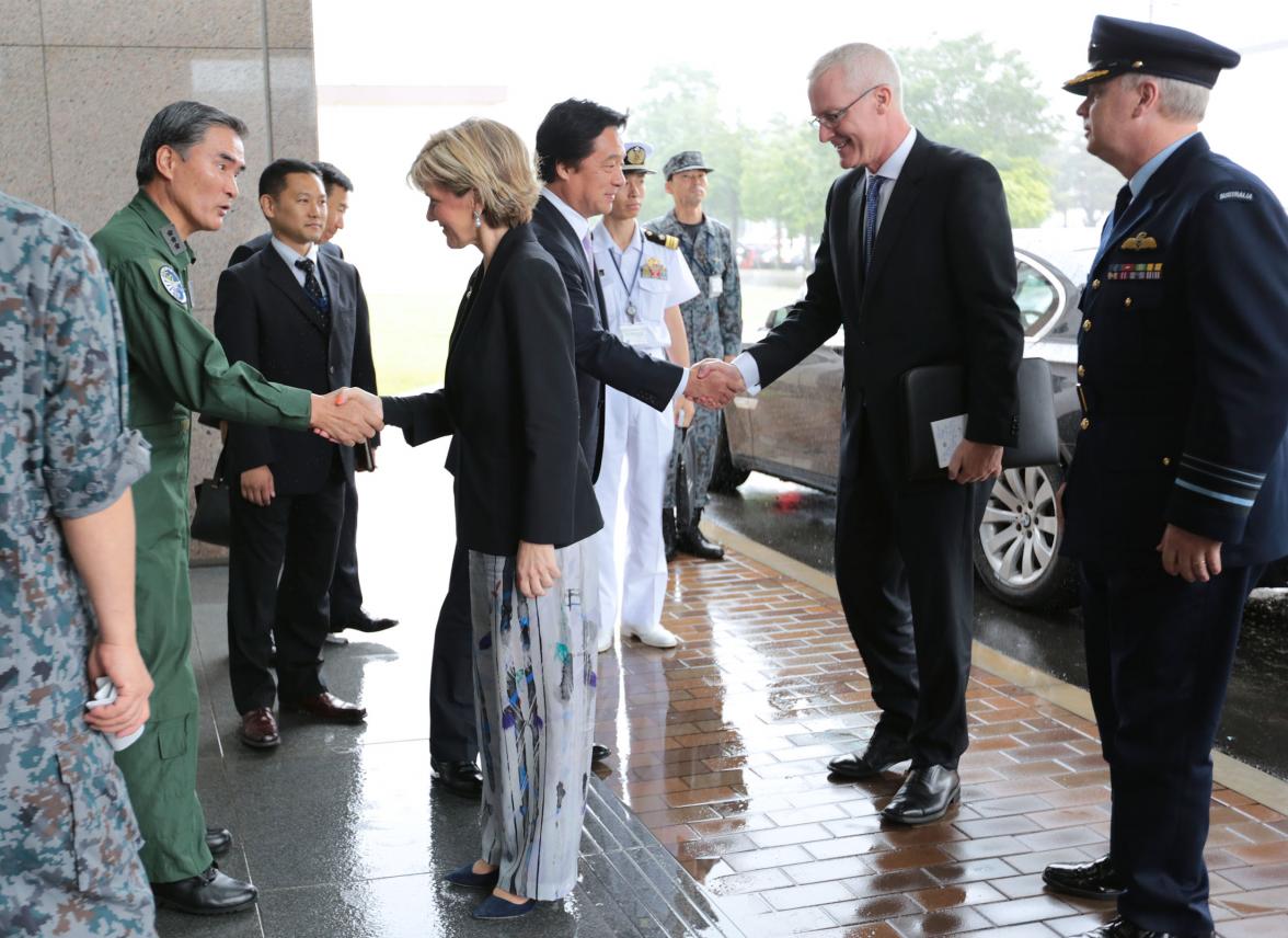 The Hon Julie Bishop MP, Minister for Foreign Affairs, greeted by Lieutenant General Nakashima, Commander Air Defence Command, and Mr Wakamiya, Parliamentary Vice Minister of Defense greeting HE Mr Bruce Miller, Australian Ambassador to Japan on arrival t