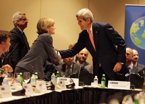 Foreign Minister Julie Bishop greets United States Secretary of State, John Kerry at a meeting of the Major Economies Forum in New York, 21 September, 2014. (Trevor Collens/DFAT). 