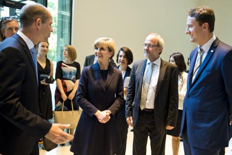 Foreign Minister Julie Bishop being welcomed by Dr Gerhard Wahlers, Deputy Secretary-General of the Konrad Adenauer Foundation, with German MPs Mr Volkmar Klein (second from right) and Mr Mark Hauptmann (right) looking on.