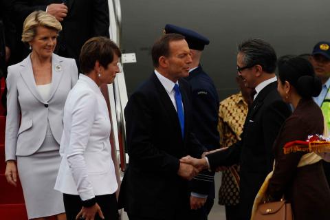 Foreign Minister Julie Bishop, Prime Minister  Tony Abbott and his wife Margie arrive at Halim Perdanakusuma Airport , Jakarta, Indonesia. 30 September 2013.