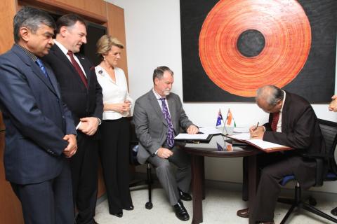 Foreign Minister Julie Bishop with Andrew Way of Alfred Health and Prof MC Misra of AIIMS at the MoU signing. 16 November 2013