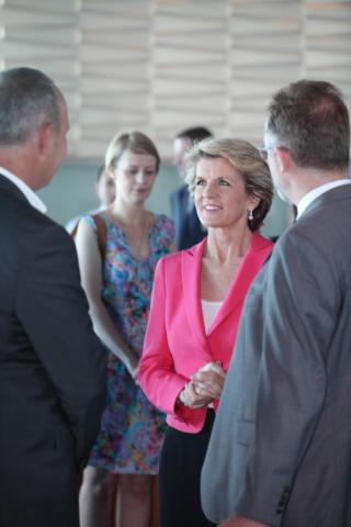 Foreign Minister Julie Bishop speaks with Justin Brown, First Assistant Secretary, Consular, Public Diplomacy and Parliamentary Affairs Division, Department of Foreign Affairs and Trade, and Andrew Daddo, former host of The Great Outdoors at the launch of