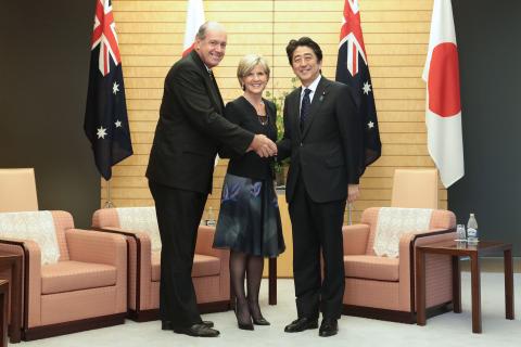 Senator the Hon David Johnston, Minster for Defence, the Hon Julie Bishop MP, Minister for Foreign Affairs, and Japanese Prime Minister, Mr Shinzo Abe shaking hands at a meeting at the Prime Minister's official residence.