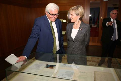 Foreign Minister Frank-Walter Steinmeier shows Foreign Minister Julie Bishop documents held in the German Foreign Office archives.