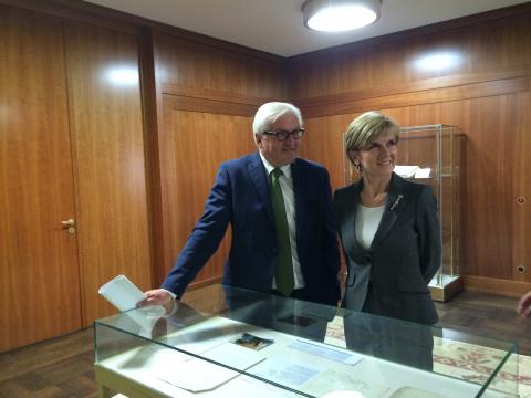 Foreign Minister Frank-Walter Steinmeier shows Foreign Minister Julie Bishop documents held in the German Foreign Office archives.