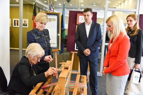 Foreign Minister Julie Bishop discusses traditional Serbian weaving at the Australian Embassy in Belgrade with Ms Violeta Jovanovic of the National Alliance for Local Economic Development, Sombor Mayor Dusanka Golubovic and Pirot Mayor Vladan Vasic, 13 Ju