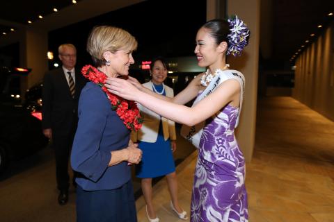 Minister for Foreign Affairs Julie Bishop is welcomed on arrival at the Pacific Island Leaders Meeting (PALM7 Summit) in Iwaki Japan by a Hawaiian-style hula dancer.