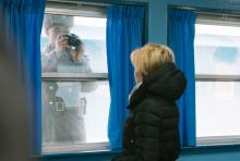 Foreign Minister Julie Bishop being observed by a North Korea soldier at ‘Building T2’, Demilitarised Zone