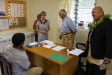 Dr Taniela Palu treats a patient at the Fua’amotu Health Clinic. Thanks to Australia’s support Dr Palu is able to treat patients in the community and alleviate the patient load on Tonga’s main hospital